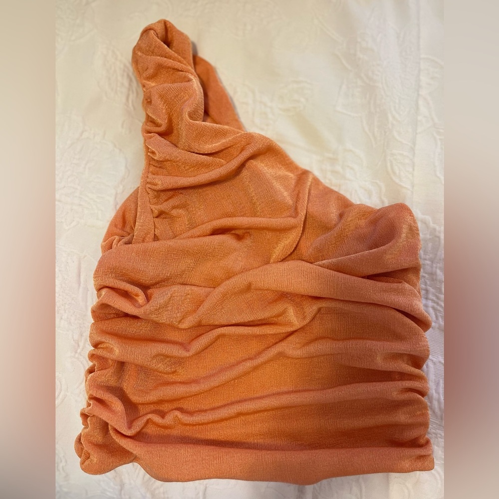 Orange going out top
